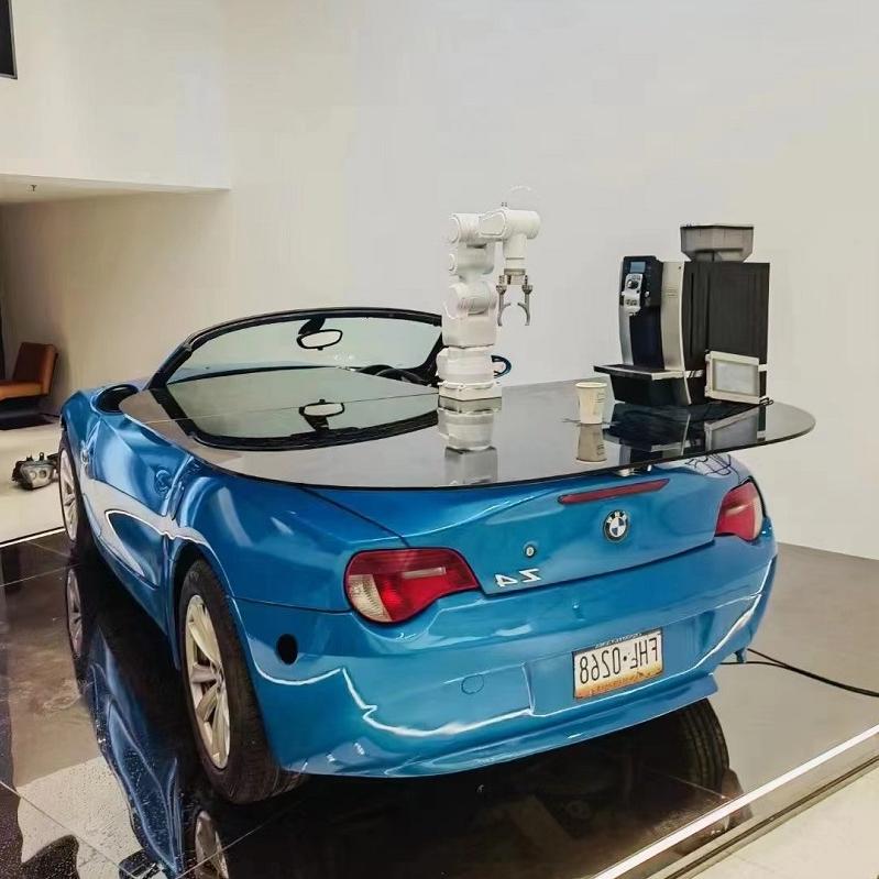 Robotic arm luxury car bar pouring coffee to entertain VIPs