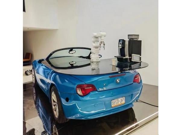 Robotic arm luxury car bar pouring coffee to entertain VIPs